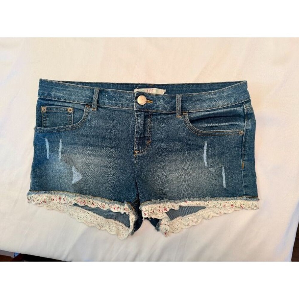 Love Fire lace trim medium wash distressed shorts. Size 13
